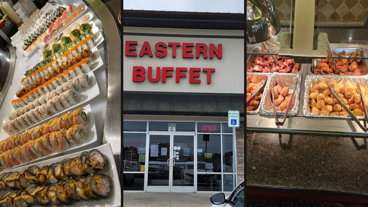 Buffet trays with assorted Asian dishes.