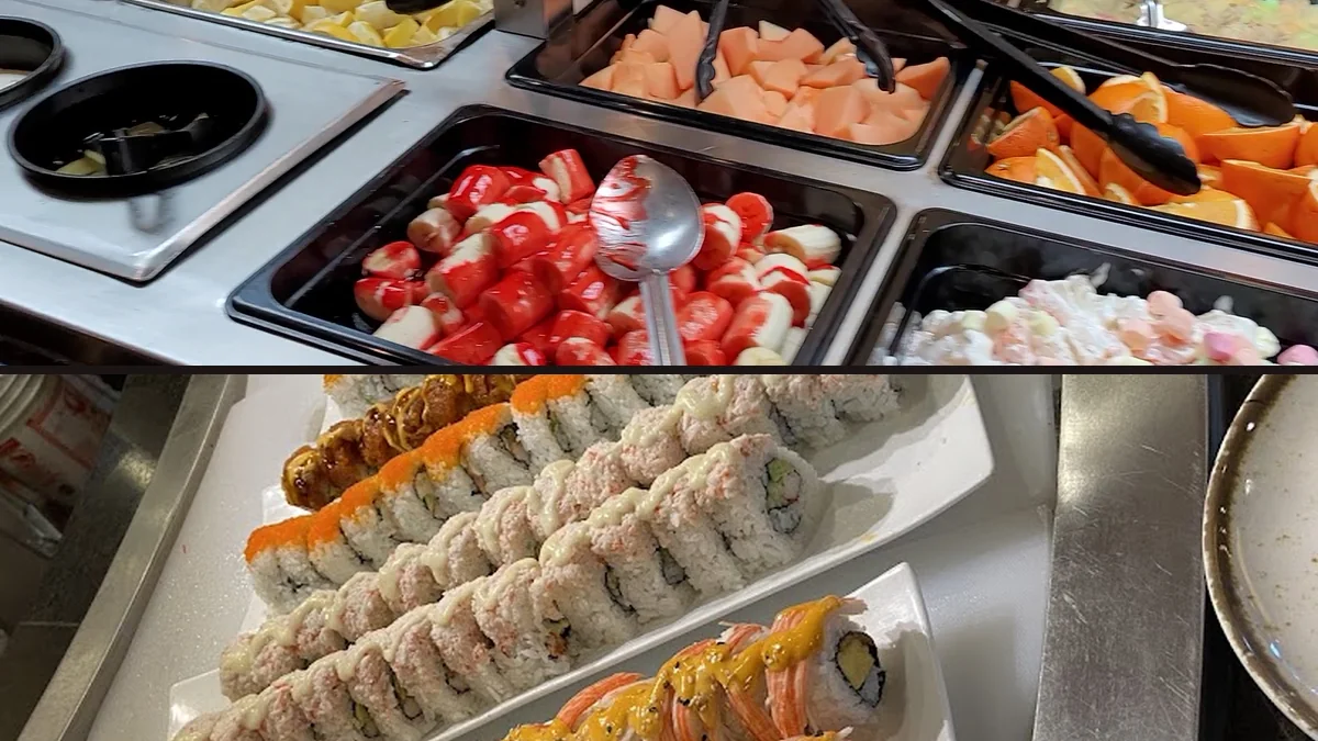 Sushi rolls arranged on a display counter.